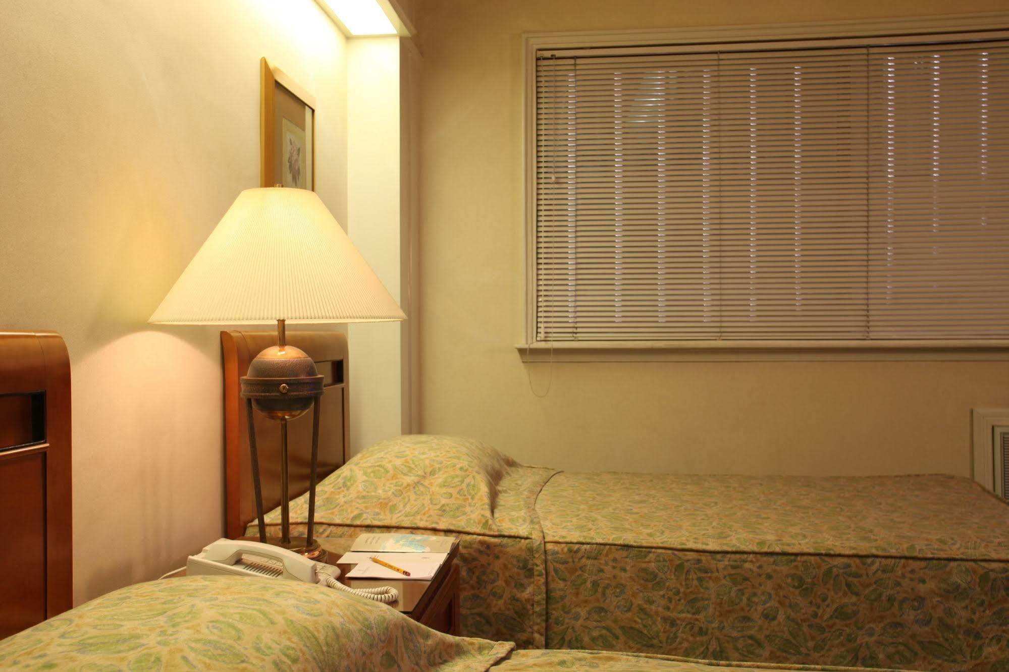 Sunny Bay Suites Manila Esterno foto